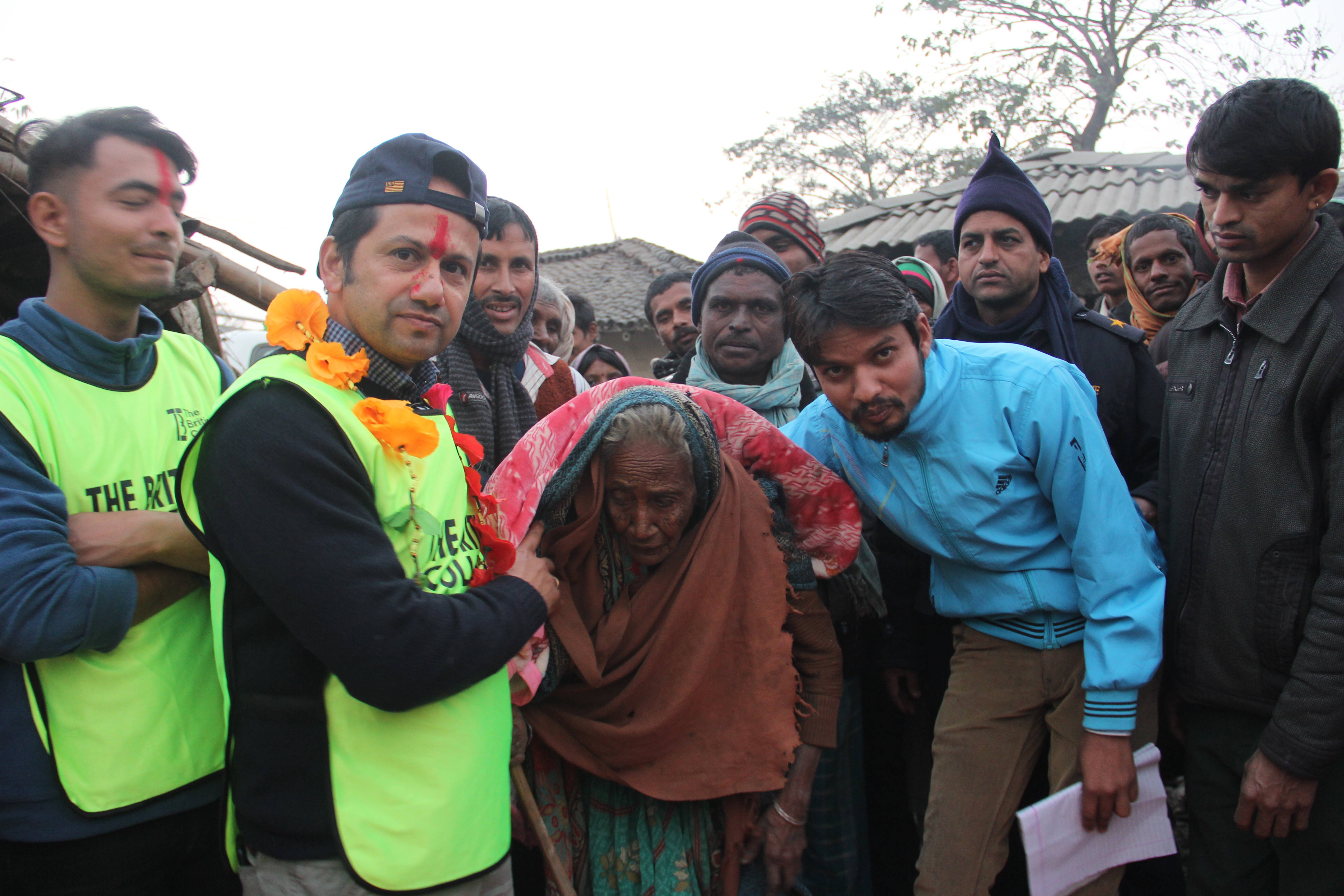 TBC Students handed out blankets to elderly people